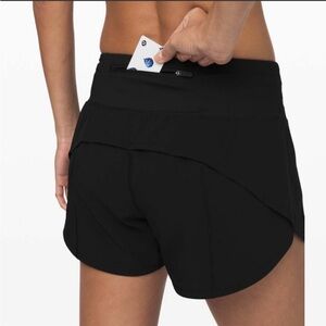 Lululemon Speed Up Mid-Rise Short
4" Black Athletic Shorts Size 4 Tall